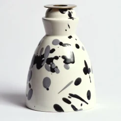 Candeliere in ceramica bianco e nero con 4 candele profumate