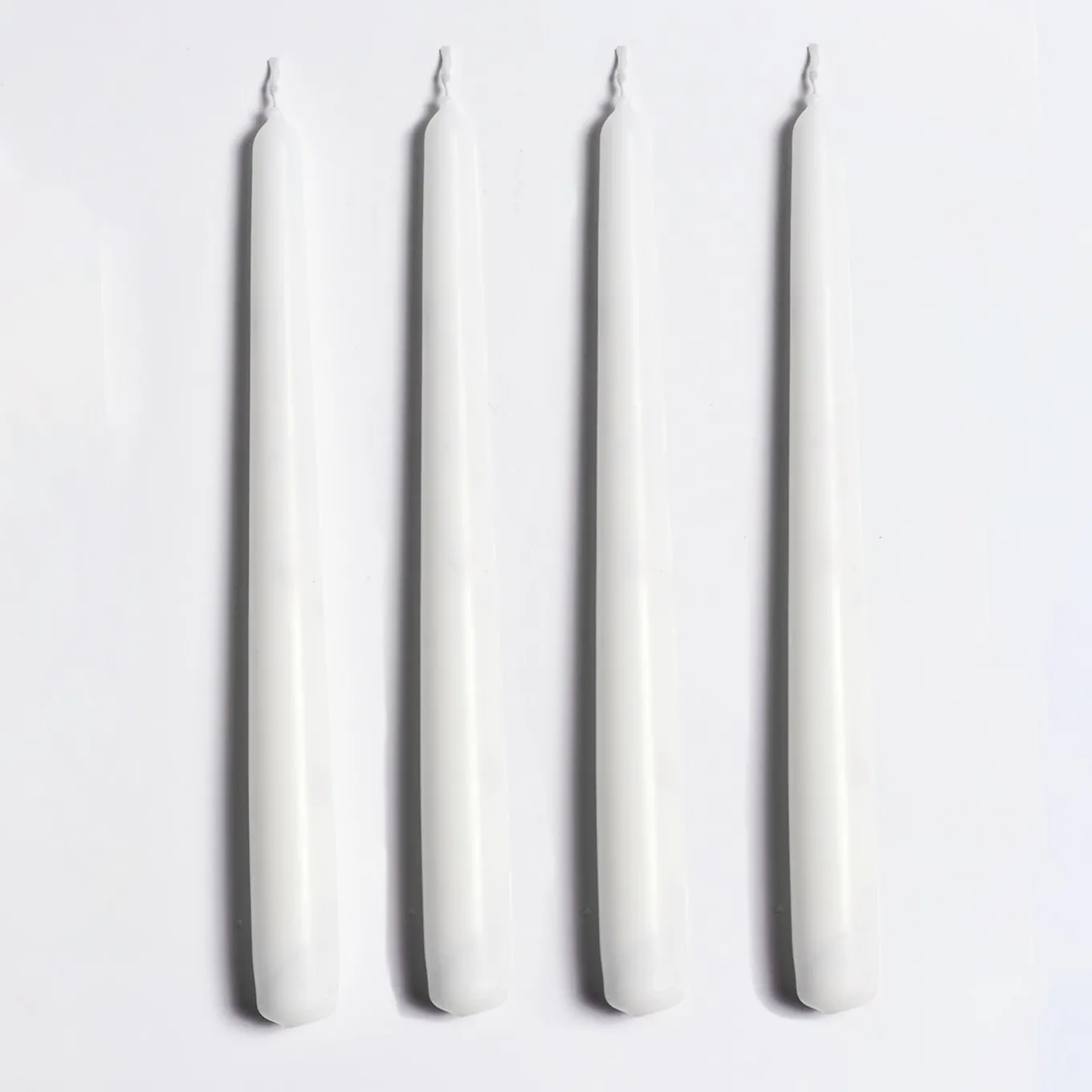 Candeliere in ceramica bianco e nero con 4 candele profumate