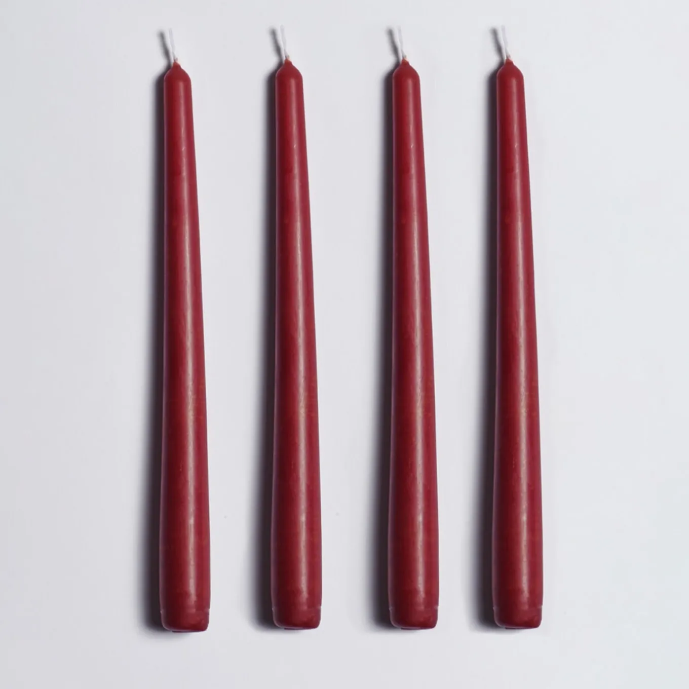 Candeliere in ceramica fucsia con 4 candele profumate
