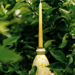 Candeliere in ceramica gialla con 4 candele profumate