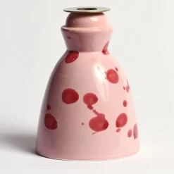 Candeliere in ceramica rosa con 4 candele profumate