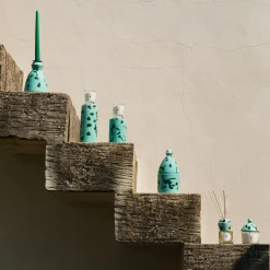 Candeliere in ceramica verde con 4 candele profumate