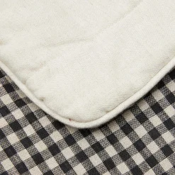Coperta di lino a quadretti bianchi e neri con profili