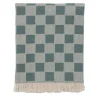 Coperta verde con frange a scacchiera