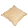 Cuscino grande con frange color crema e giallo
