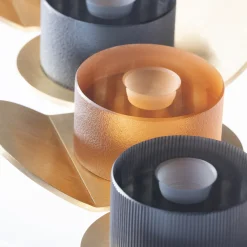 Portacandele Lumino Stripe in acciaio grigio e cristallo di Federico Peri