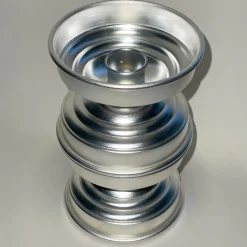 Portacandele scultoreo in ottone placcato argento