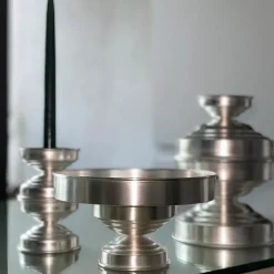 Portacandele scultoreo in ottone placcato argento