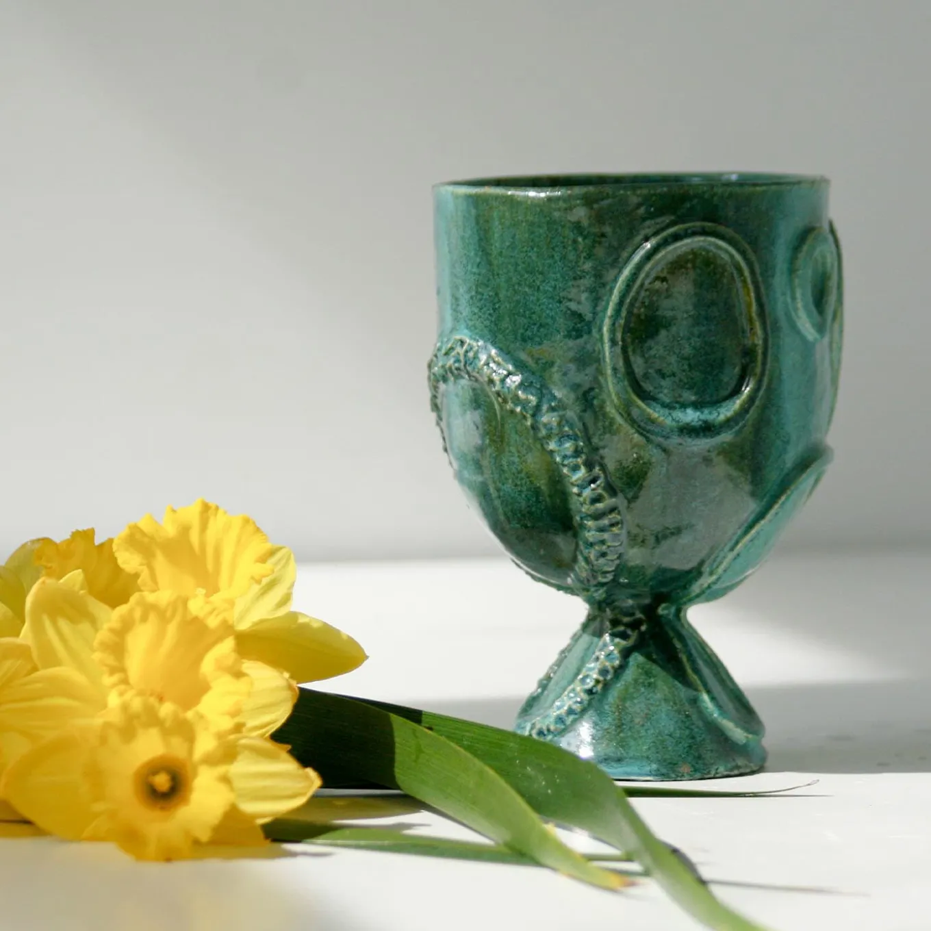 Portavaso in ceramica verde Acini