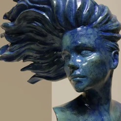 Scultura Donna nel vento