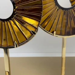 Scultura in vetro ambrato a tre occhi