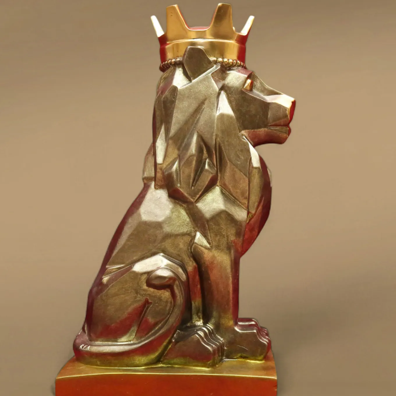 Scultura <leone stilizzato seduto in ottone