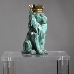 Scultura Leone stilizzato seduto in bronzo