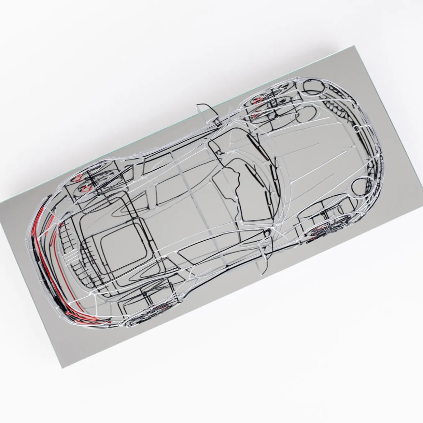 Scultura Porsche in filo metallico