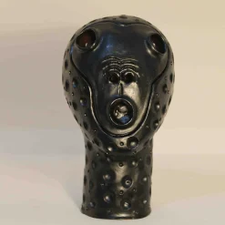 Scultura testa di scimmia nera
